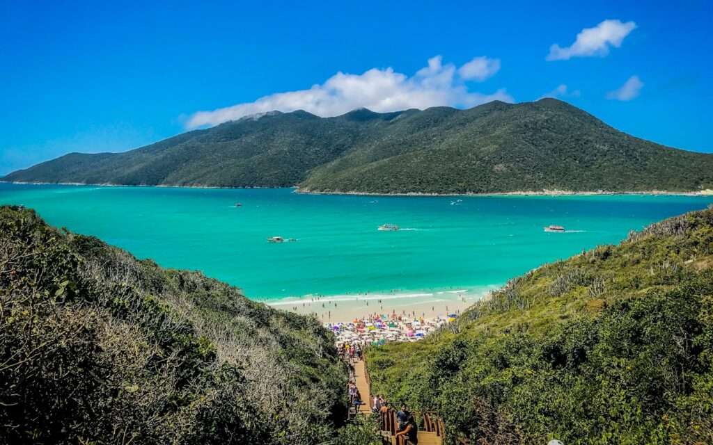 Turquoise water and white sand at Arraial do Cabo from the trail above